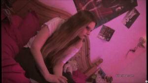 A blonde girl in a room in Flesh Eating Geriatric Internet Predator.